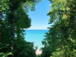 Tucked in the trees on the shores of Lake Michigan